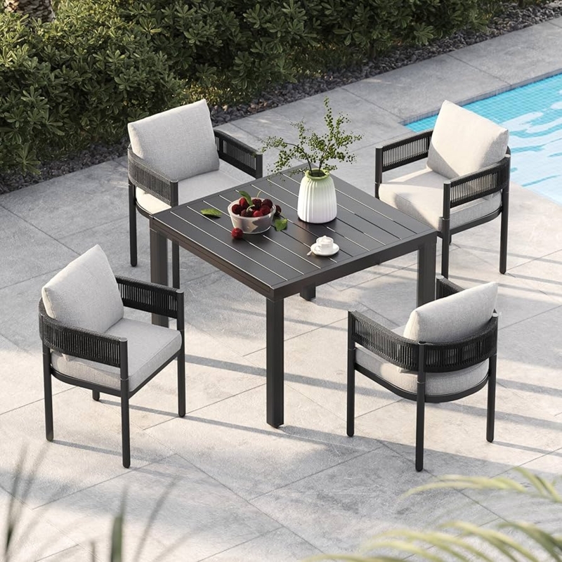 Outdoor Dining Set Woven Wicker Accents with White Cushions Poolside