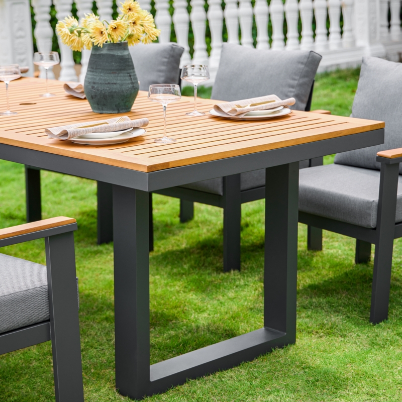 Outdoor Dining Table: Teak Slat Top on Charcoal Aluminum Block Legs