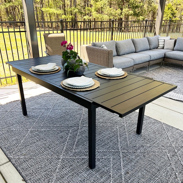 Outdoor Dining Table with Extendable Leaf and Slatted Metal Top