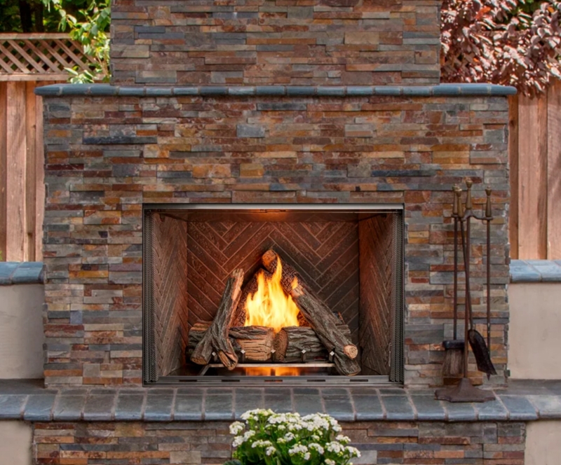 Outdoor Fireplace Built In Stone Patio Hearth with Realistic Logs.