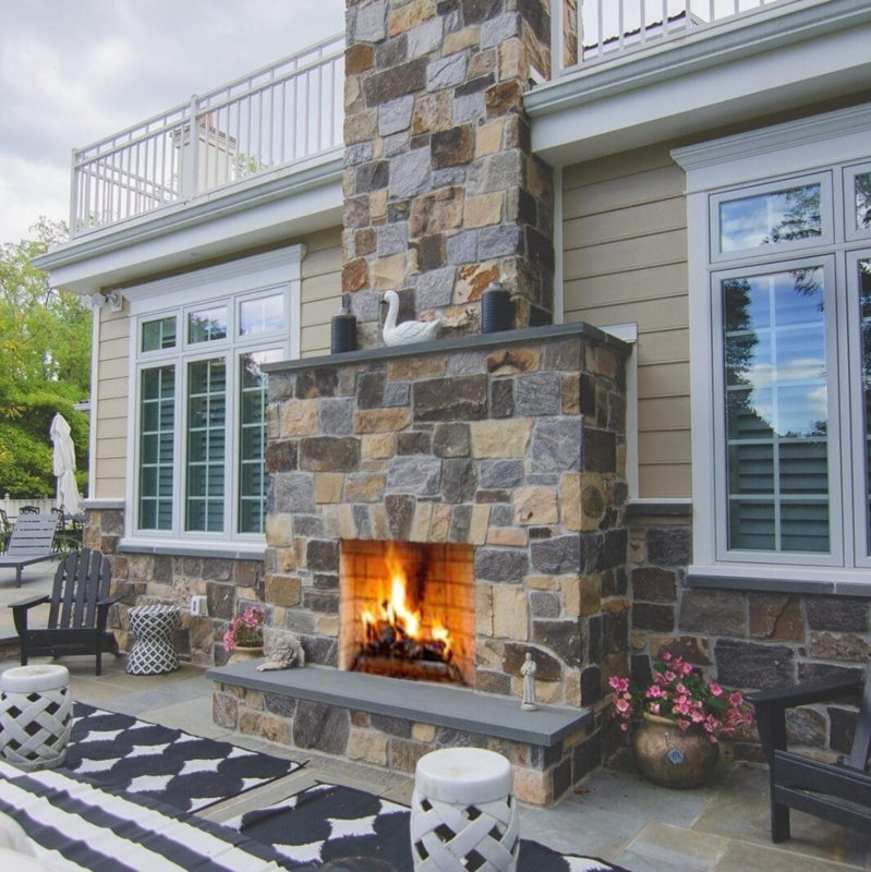 Outdoor Fireplace Grand Fieldstone Masonry with Vaulted Timber Ceiling