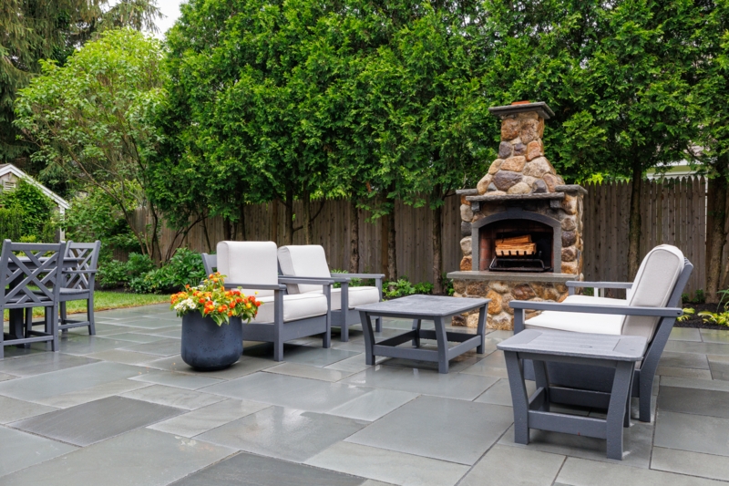 Outdoor Fireplace Masonry Stacked Stone Circular Layout Traditional