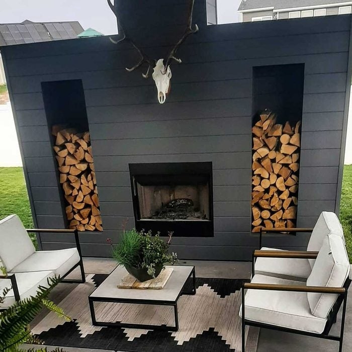 Outdoor Fireplace Rustic Stone with Arched Opening and Raised Hearth