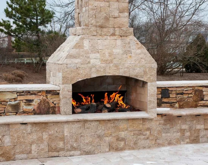 Outdoor Fireplace Stately Stone Veneer on Luxury Flagstone Patio.