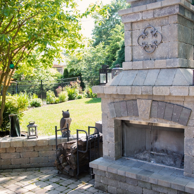 Outdoor Fireplace Stone Masonry Covered Deck Integration Timber Beam