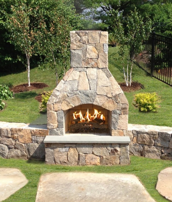 Outdoor Fireplace with Dual Wood Boxes and Stacked Stone Look