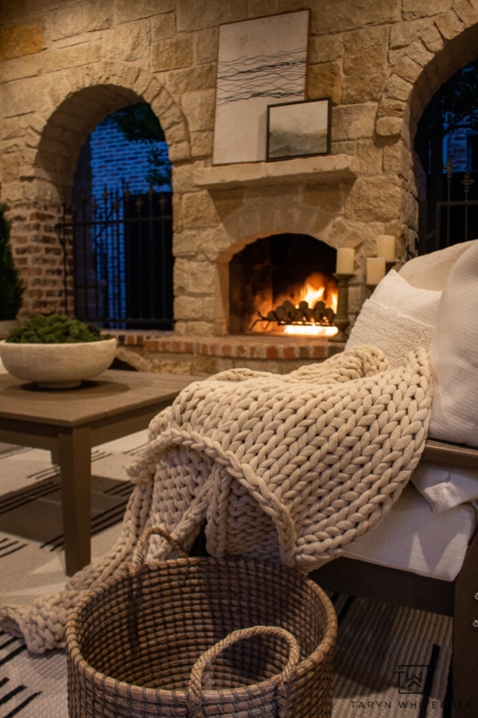 Outdoor Sectional Monochrome Stucco Fireplace Mixed Pattern Pillows