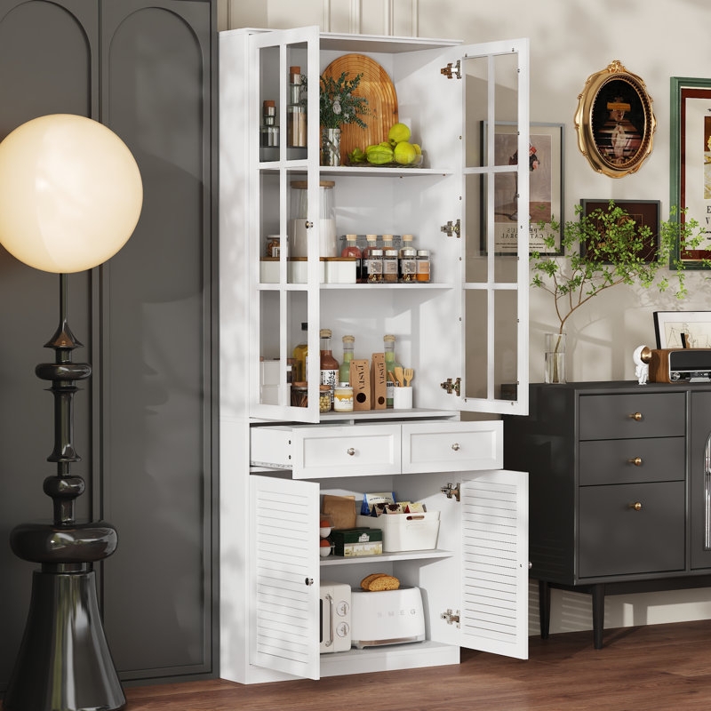Pantry Cabinet featuring Wood Toned Counter and White Shaker Style