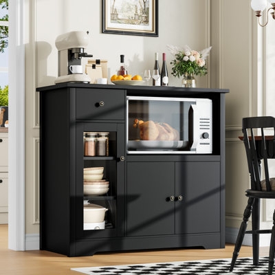 Pantry Cabinet with Microwave Cubby and Central Drawer.