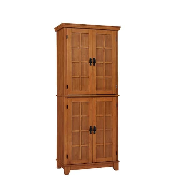 Pantry Cabinet with Recessed Panel Doors and Tapered Feet, Warm Wood