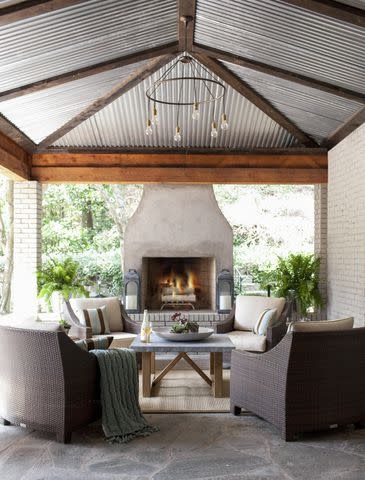 Patio Flagstone with Armchairs and Built-in Fireplace Design