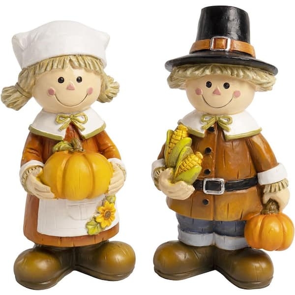 Pilgrim Figurine Set Holding Pumpkins for Traditional Harvest Display