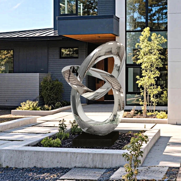 Polished Silver Abstract Sculpture Intertwined Form Pedestal Base