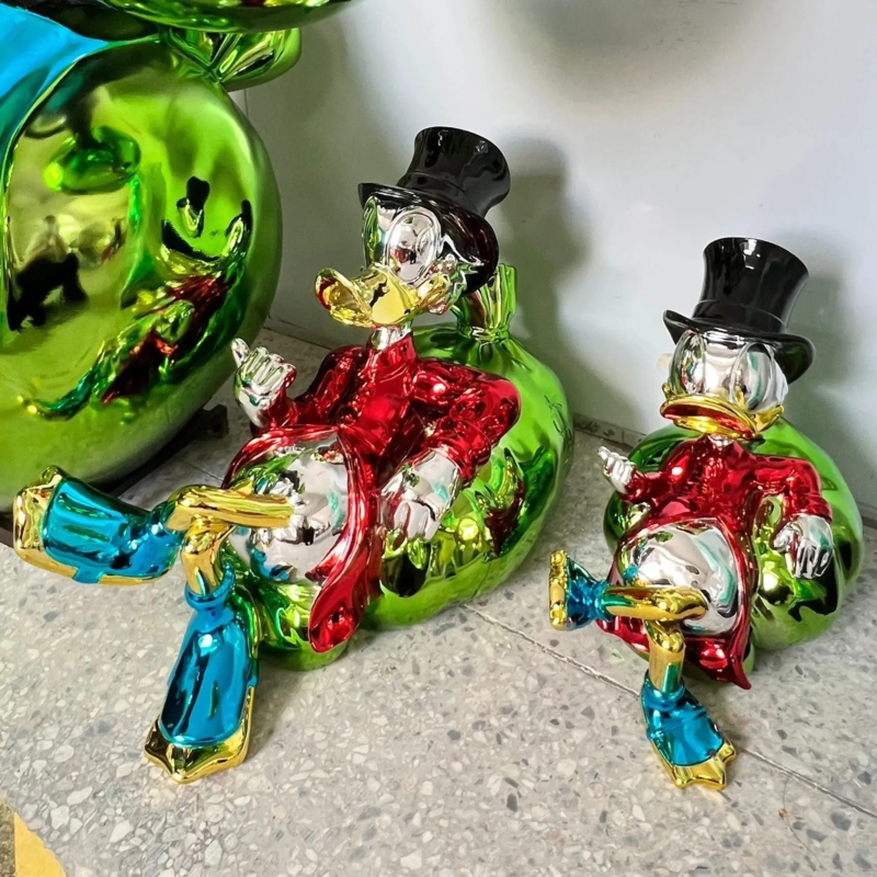 Pop Art Duck Sculpture, Glossy Chrome Finish on Gold Bar Base
