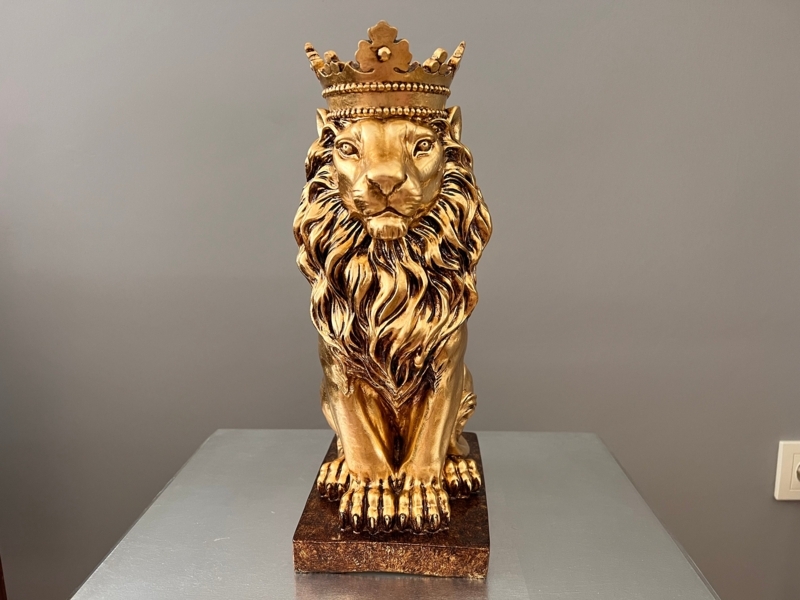 Regal Lion Statue in Polished Metallic Prowling Pose with Textured Mane