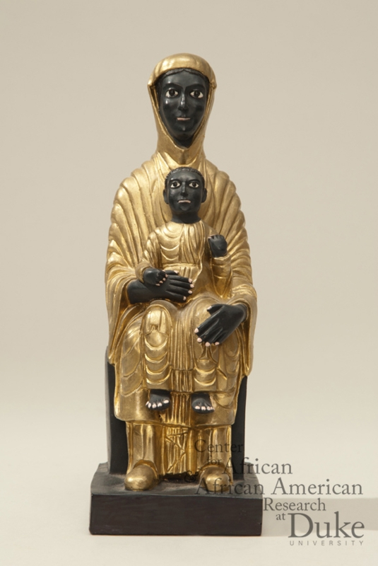 Religious Statue: Black Madonna Iconography with Gold Toned Drapery.