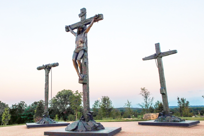 Religious Statue, Contrasting Dark Cross Life Sized Crucifix Sculpture.