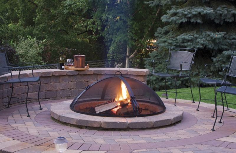 Round Fire Pit with Blue Glass Media for Modern Patio Seating