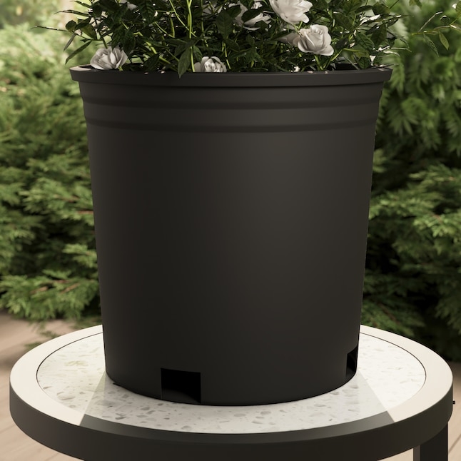 Round Planter Matte Black Vertical Ribbed Texture Organic Modern