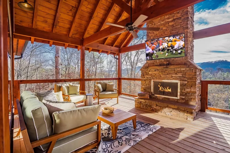 Rustic Log Cabin Bedroom with Vaulted Beamed Ceiling and Wood Bed