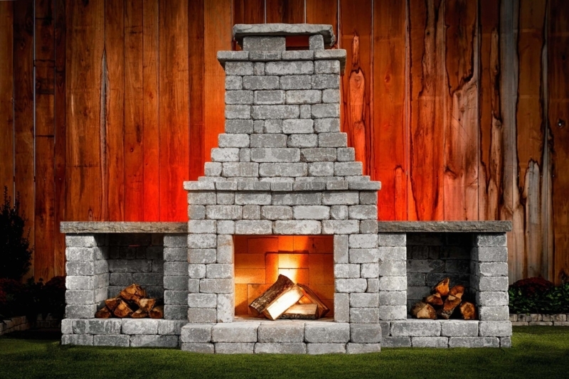 Rustic Masonry Outdoor Fireplace with Arched Opening