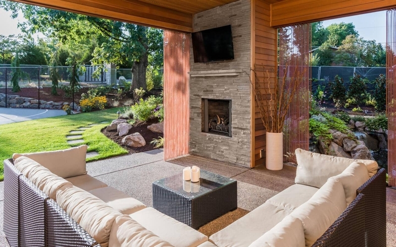 Rustic Modern Stone Veneer Outdoor Fireplace with Tall Chimney