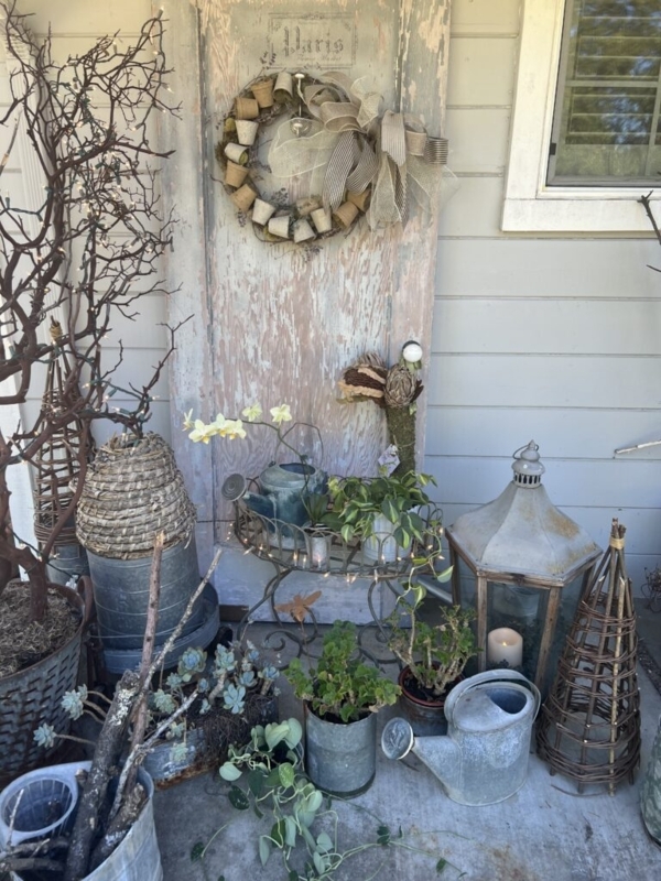Rustic Outdoor Lounge Styling with Woven Rug & Stone Fireplace