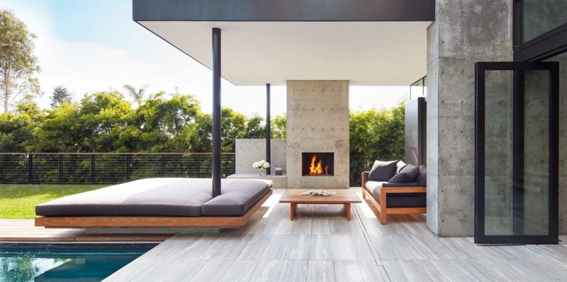 Rustic Stacked Stone Outdoor Fireplace with Built-In Storage