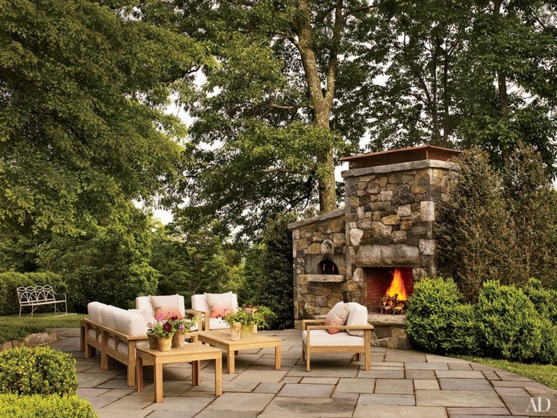 Sculptural White Stucco Outdoor Fireplace in Desert Patio