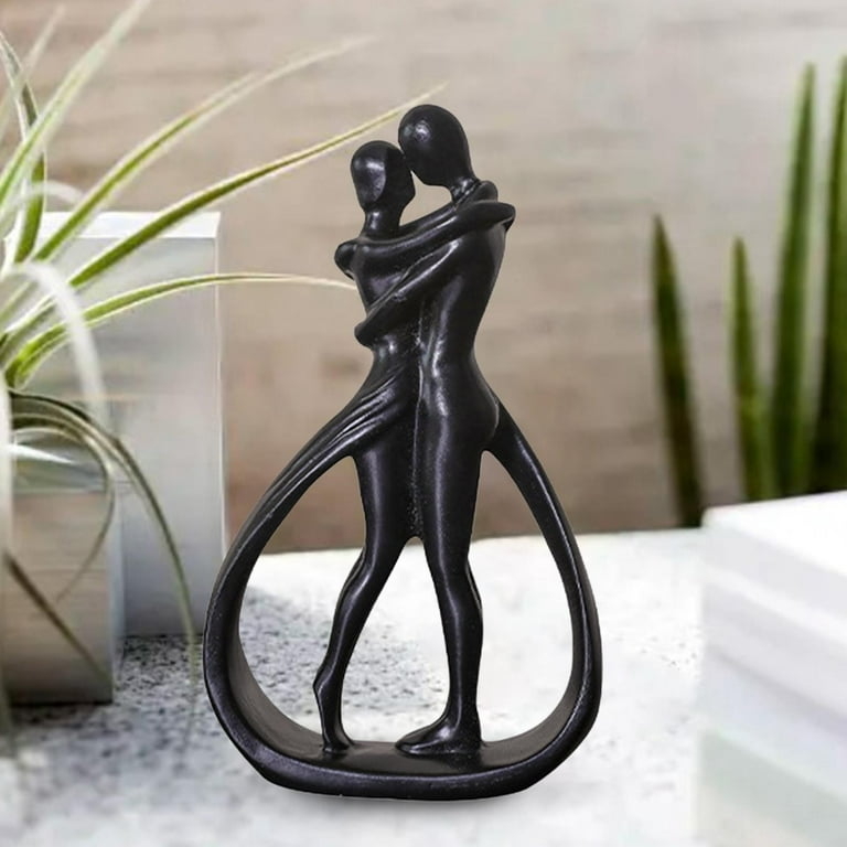 Sculpture: Resin Abstract Embrace on Circular Pedestal Base.