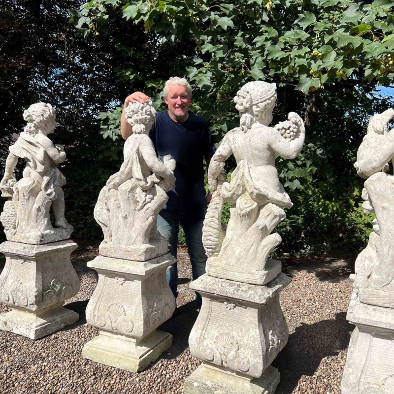 Sculpture Set Four Seasons Weathered Stone on Tiered Plinths