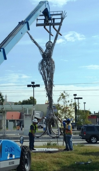 Sculpture: Stylized Horse Silhouette at Urban Transit Station