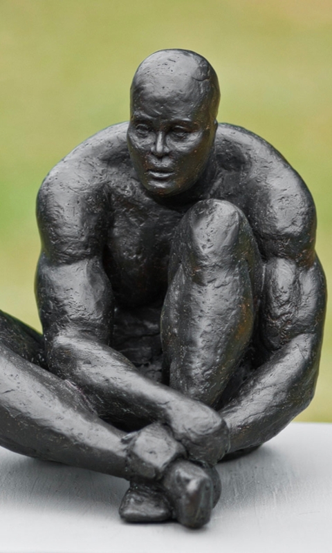 Sculpture: Wood Toned Figurative Guardian Form for Garden Setting.