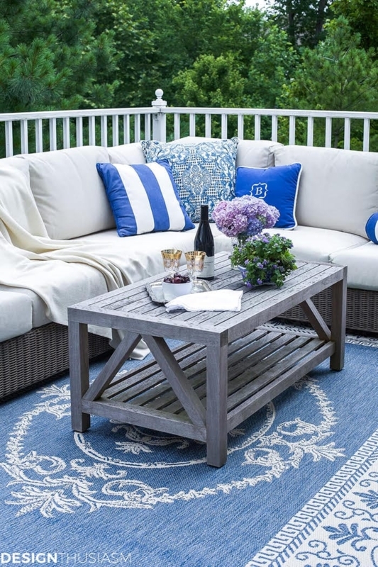 Sectional Sofa Woven Base with Plush Cushions and Medallion Rug on Deck