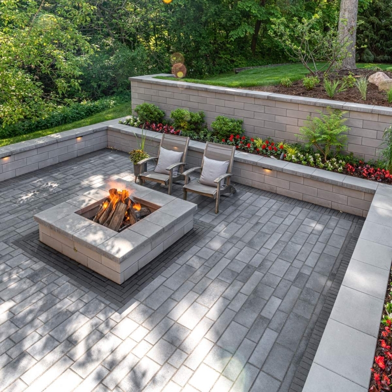 Square Masonry Fire Pit with Integrated Landscape Lighting
