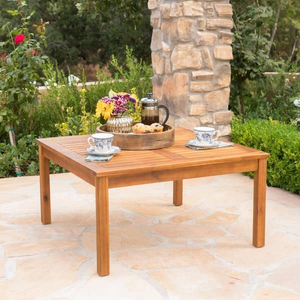 Square Outdoor Coffee Table with Slatted Top and Tapered Wood-Toned Legs