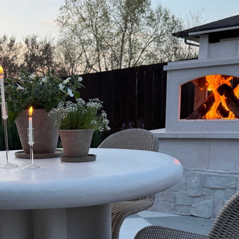 Stacked Stone Outdoor Fireplace with Integrated Chimney