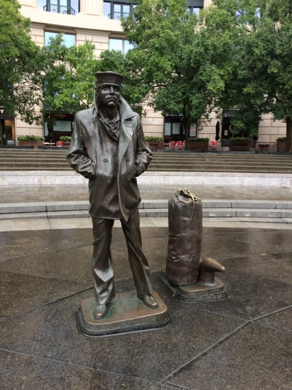 Statue Bronze Sailor Figure Compass Rose Pavement Memorial Plaza