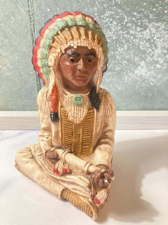 Statue Full-Length Silhouette Headdress Detail Earthy Palette Accent