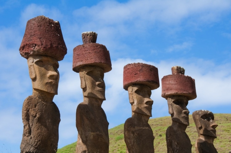 Statue Row with Pukao Head Ornaments in Bright Daylight