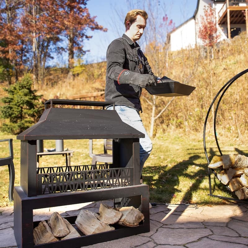 Steel Outdoor Fireplace with Screened Firebox and Log Storage Base