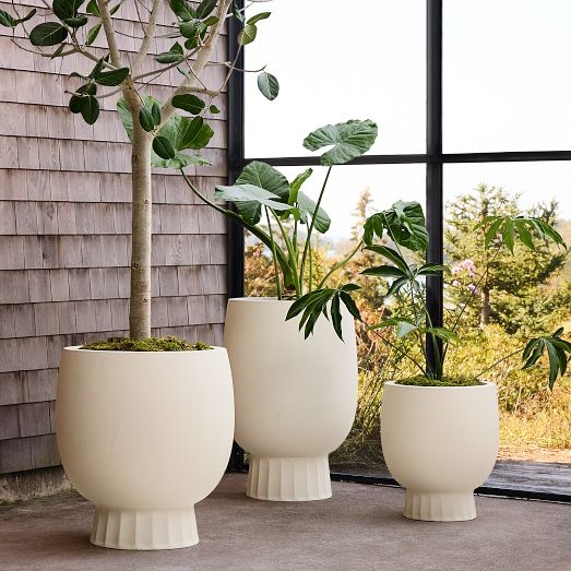 Stone-Like Planter Set with Tapered Silhouette and Varying Heights