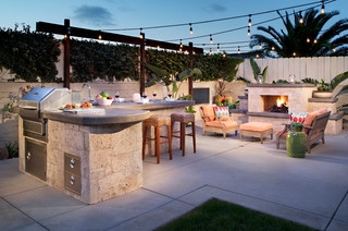 Stone Patio with Fireplace Ideas featuring Beige Sectional Sofa