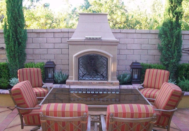 Stone Textured Outdoor Fireplace with Oversized Mantel and Hearth