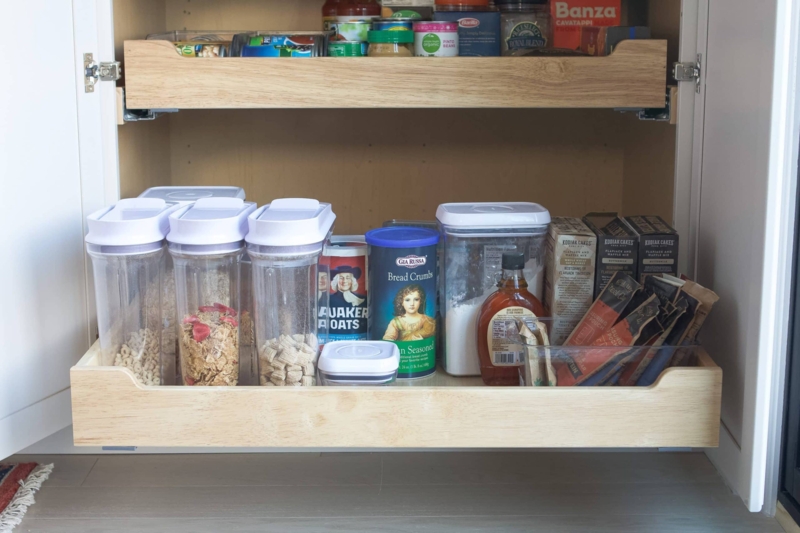 Storage Basket of Woven Fiber with Gold Cup Pulls in Deep Drawers