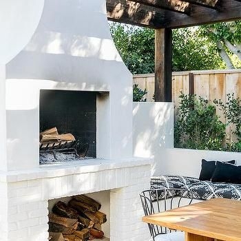 Stucco Fireplace White With Dark Pergola Wood Decking Patio Layout