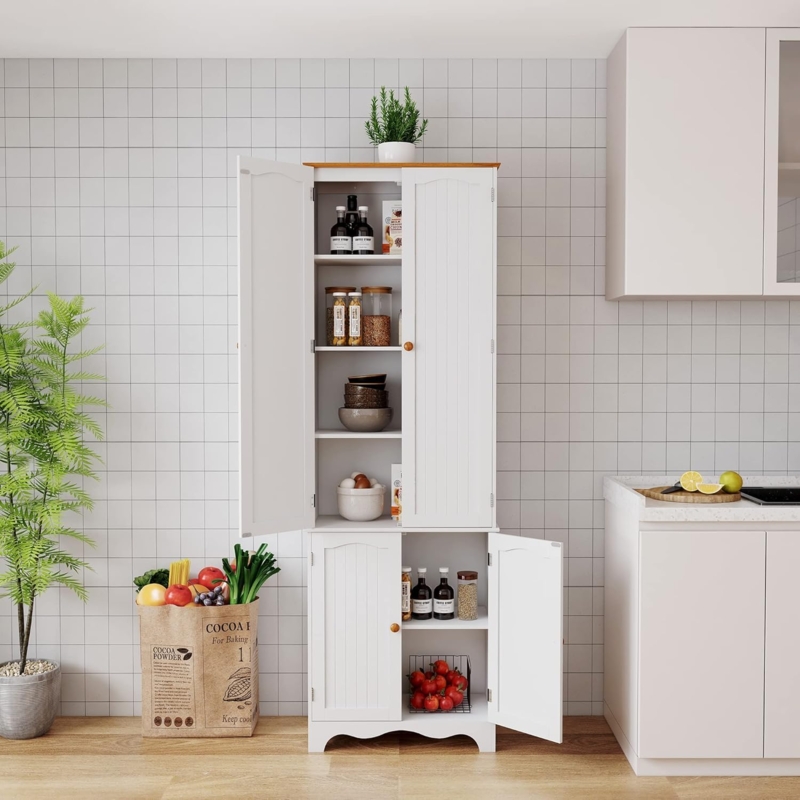 Tall Shaker Pantry Cabinet with Central Storage Drawers and Black Knobs.