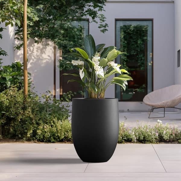 Tapered Planter, Charcoal Stone Finish. Contemporary deck greenery display.