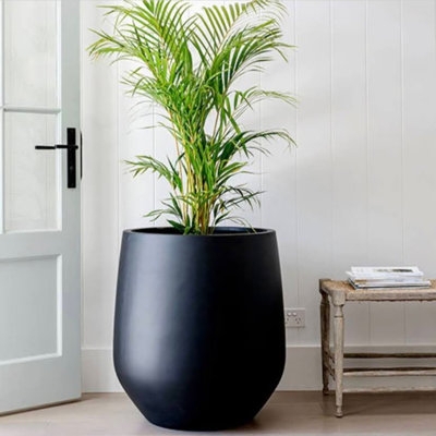 Textured Stone Bowl Planter with Pitted Surface and Wide Opening