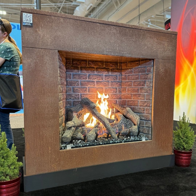Traditional Built-In Outdoor Fireplace with Herringbone Brick Lining